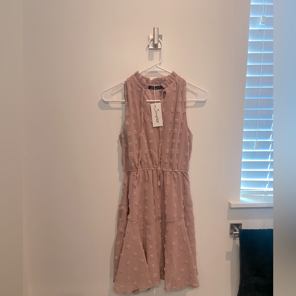 Sleeveless/Flowy mini dress